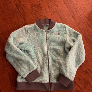 The North Face blue girls XL zip up fleece